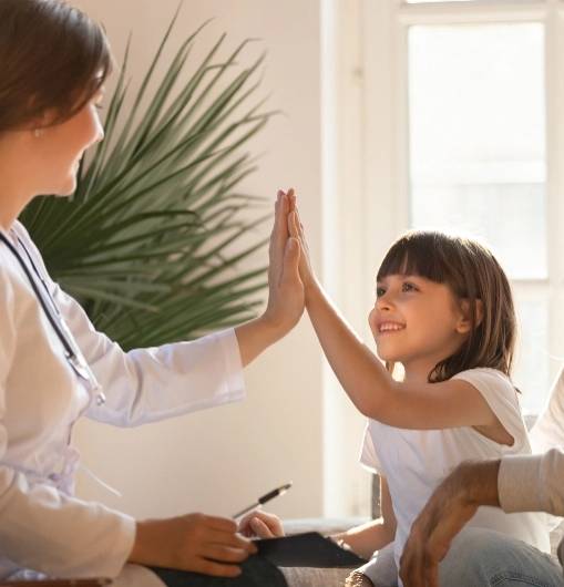 Healthcare professional and young patient during a visit at a private clinic in Montreal