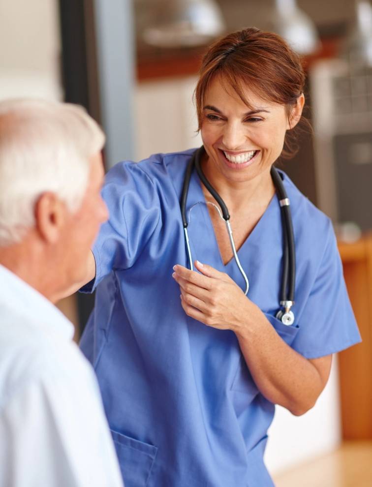 Smiling nurse practitioner with a patient at Clinique Médicale 360 in Montreal